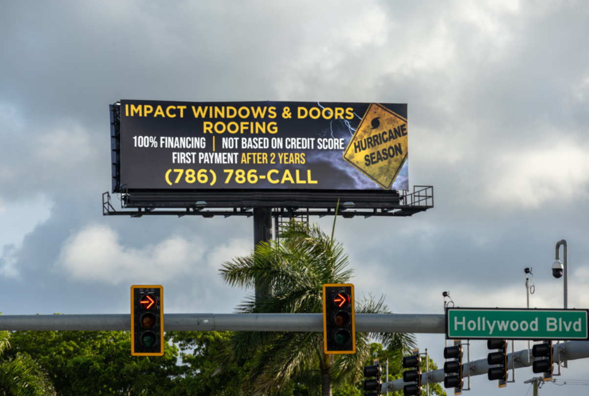 Static billboard for roofing company along Hollywood Blvd